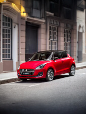 Susuki swift Desire rojo una muy buena opción como vehículo híbrido usado